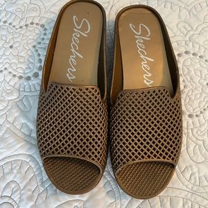 Gold Skechers wedge sandals